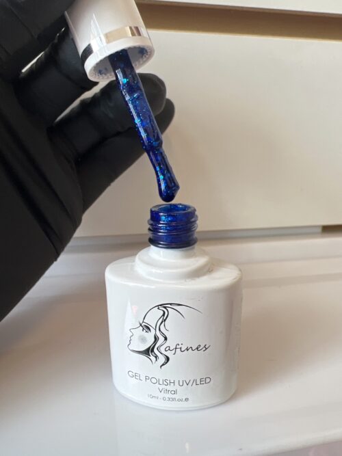 ac267822-1e1b-4450-8908-cf6618e4d305-5400-00000513bd1d66fe_file Esmalte con glitter N47