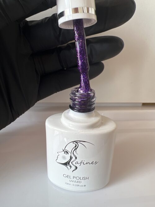 e2a07f9a-bafc-4ebf-bb7b-f17475b03329-5400-000005116a6a6a10_file Esmalte Con glitter N027