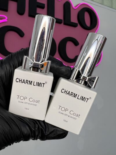 Top Charm limit moño