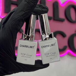Top Charm limit moño