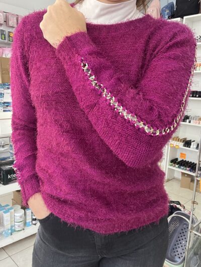 Buzo rosa elastizado con detalle de cadenas